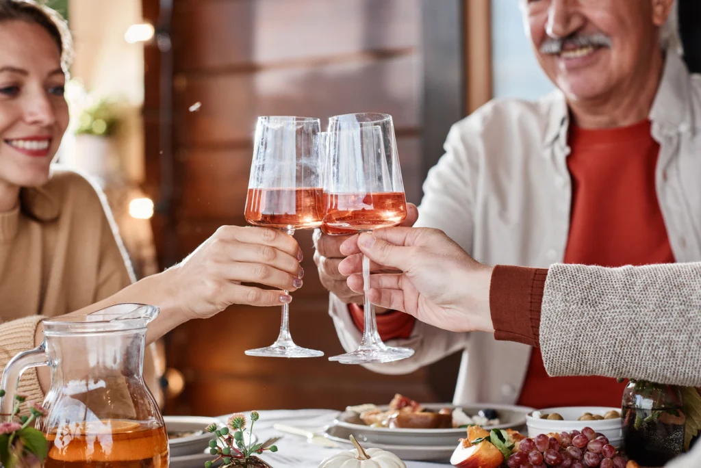 Adults Clink Glasses With Red Wine Free Stock Photo By Everypixel